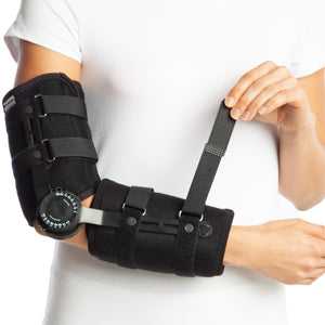 hinged elbow support worn by model showing the velcors
