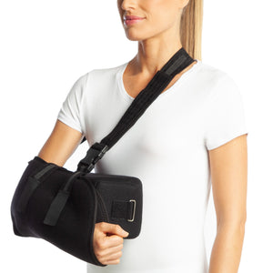 Padded Arm Support is worn by the model